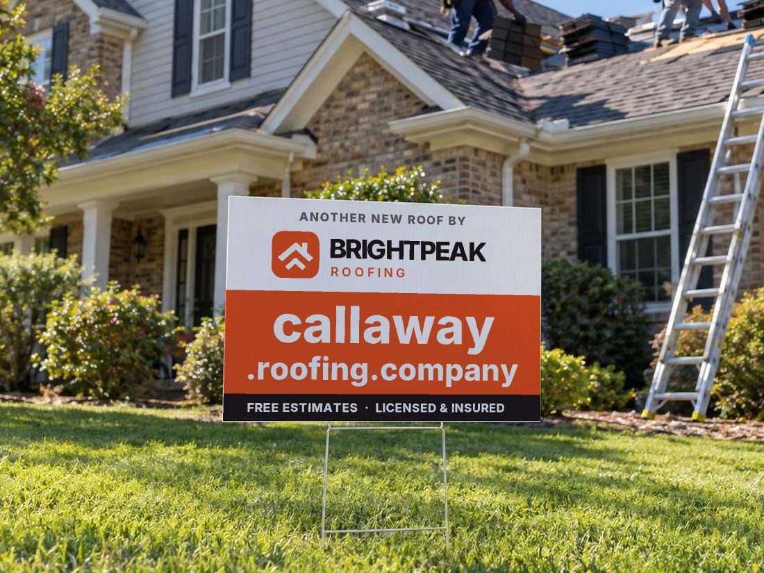 callaway.roofing.company on a yard sign in front of a house getting a new roof